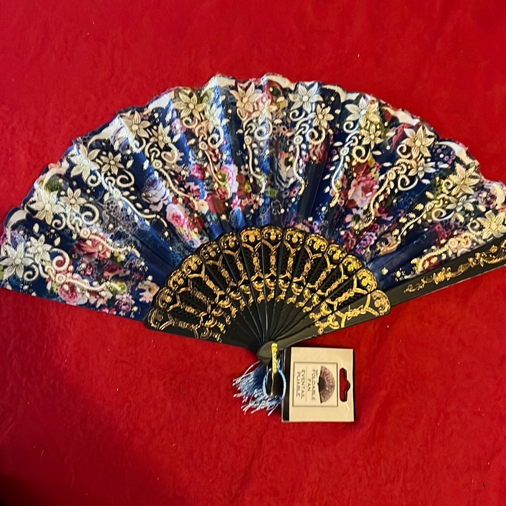 Victorian style hand held fan . Blue with white flowers and gold accents NWT